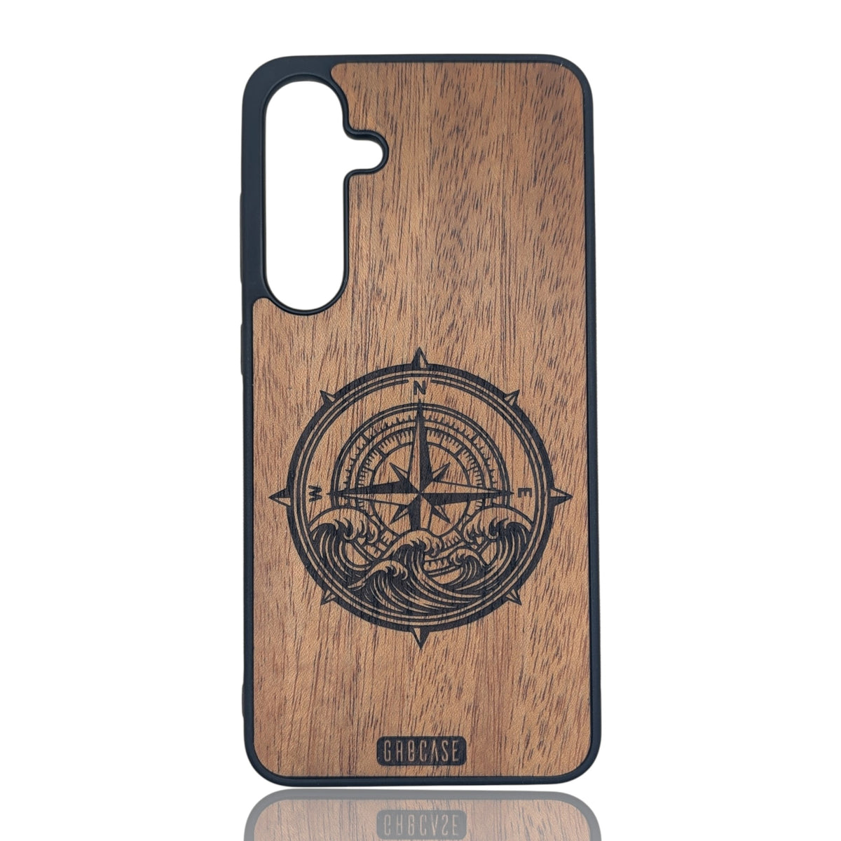 Detailed laser-engraved nautical compass and ocean waves on a premium wood phone case.