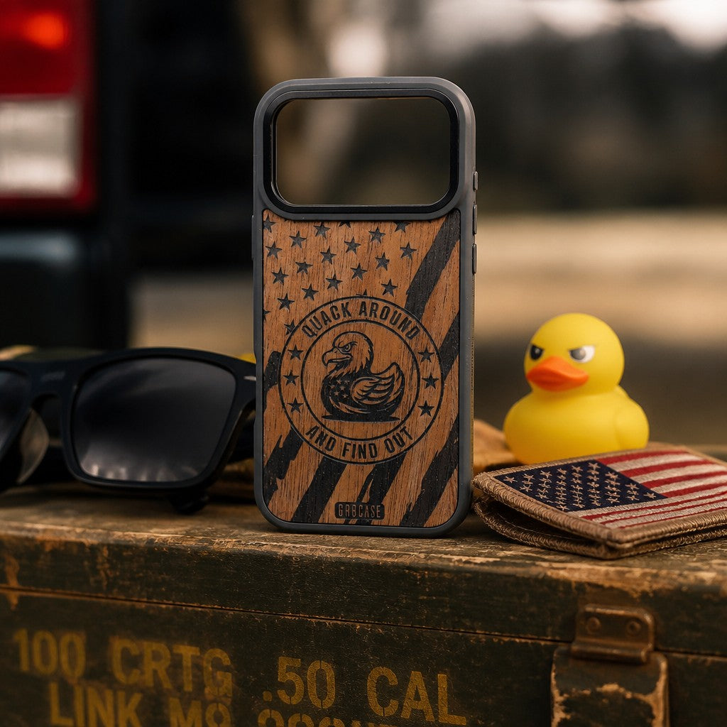 A protective phone case featuring natural wood with a black American flag , 'QUACK AROUND AND FIND OUT'. 