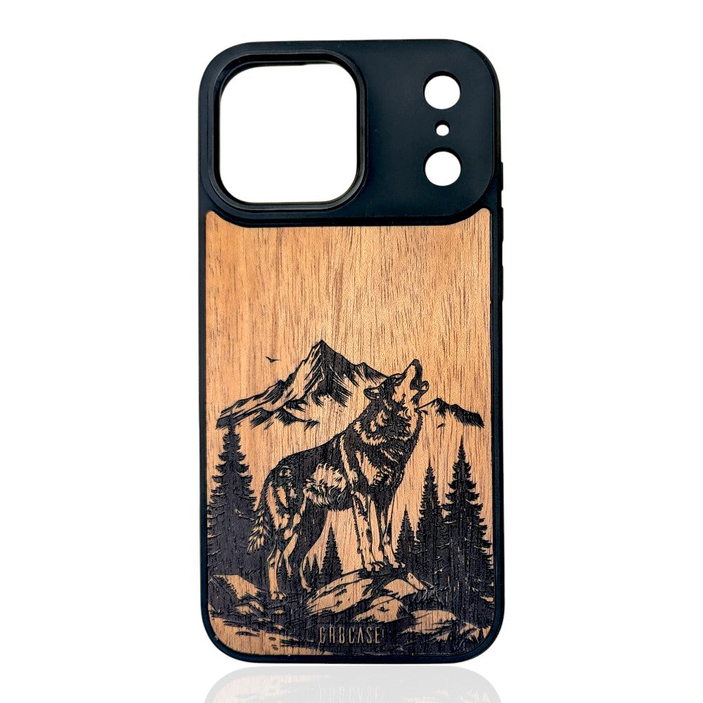 Hand-finished wood phone case featuring a detailed howling wolf amidst a mountain and pine forest landscape.