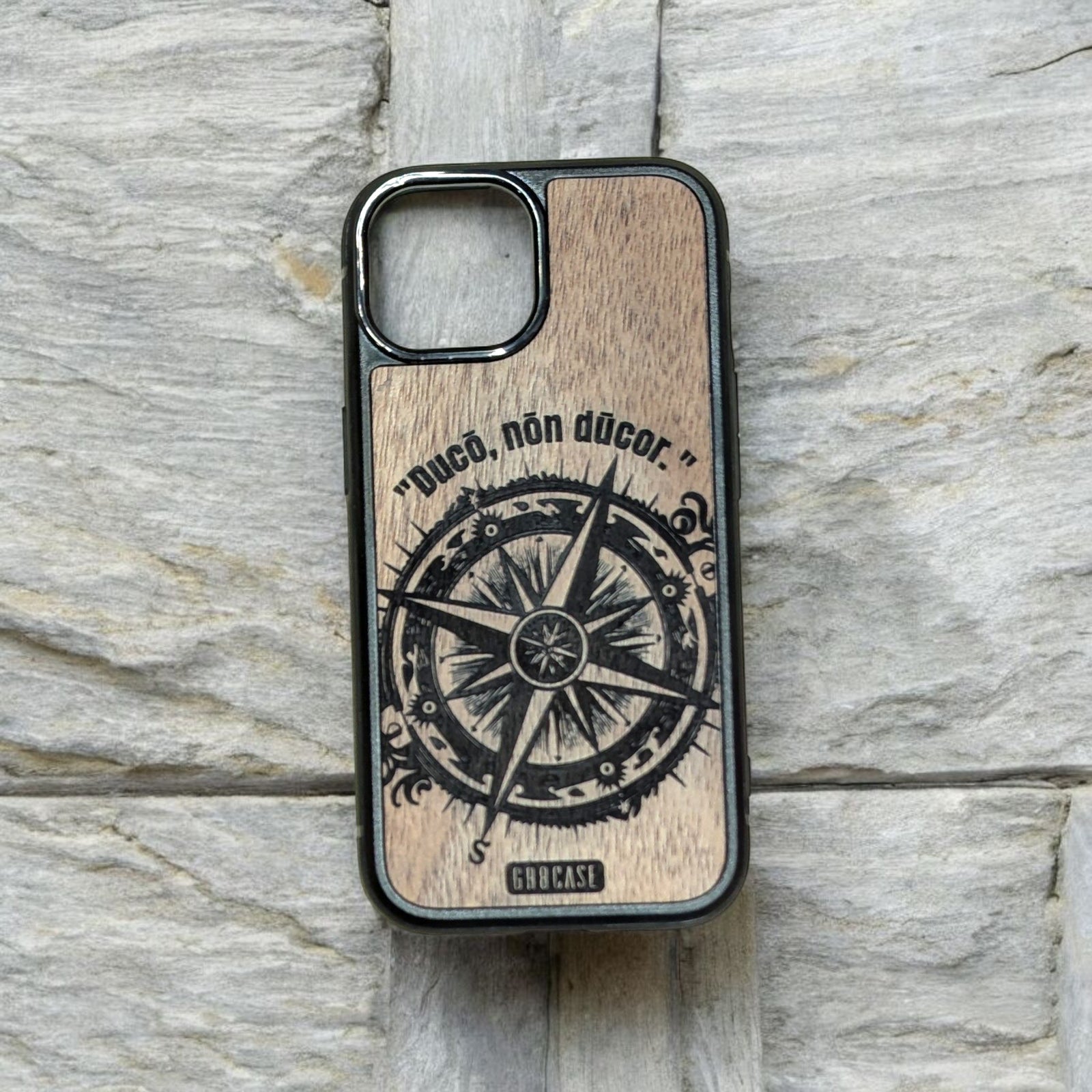 True North Compass wood phone case with engraved design on cherry hardwood
